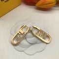 Fendi OLock Diamonds 18K Gold Earrings product image 1, provided for visual reference and product detail review