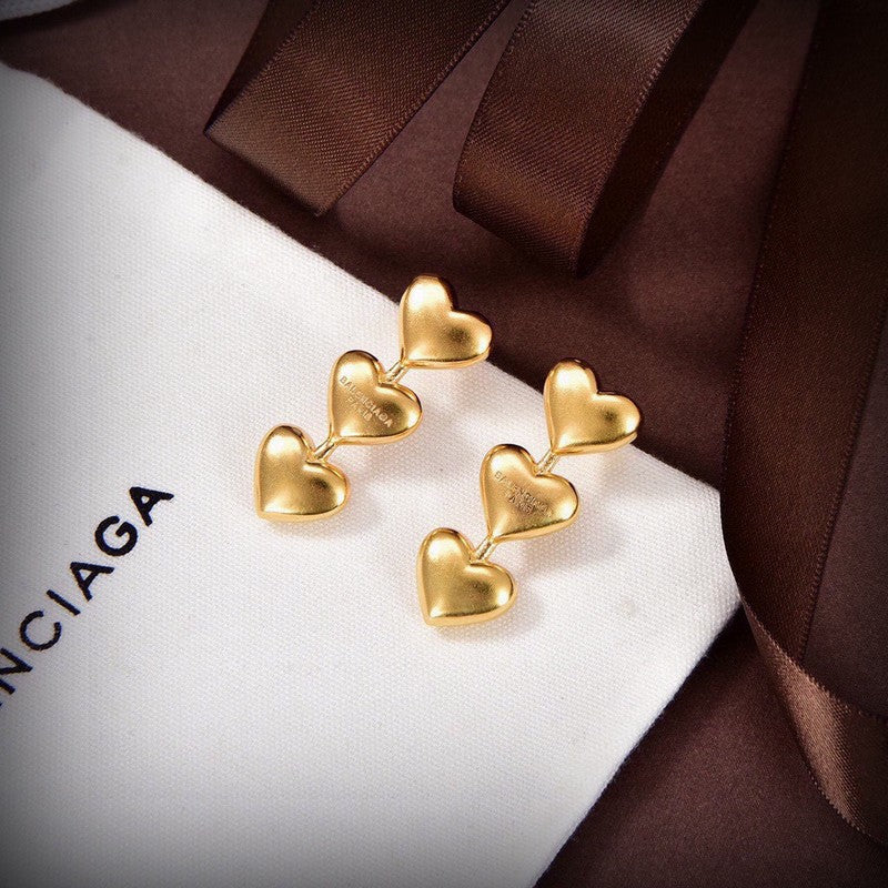 Balenciaga Three Heart Gold 18K Gold Earrings product image 2, provided for visual reference and product detail review
