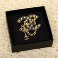 Chanel Black Chain 18K Gold Brooch product image 1, provided for visual reference and product detail review