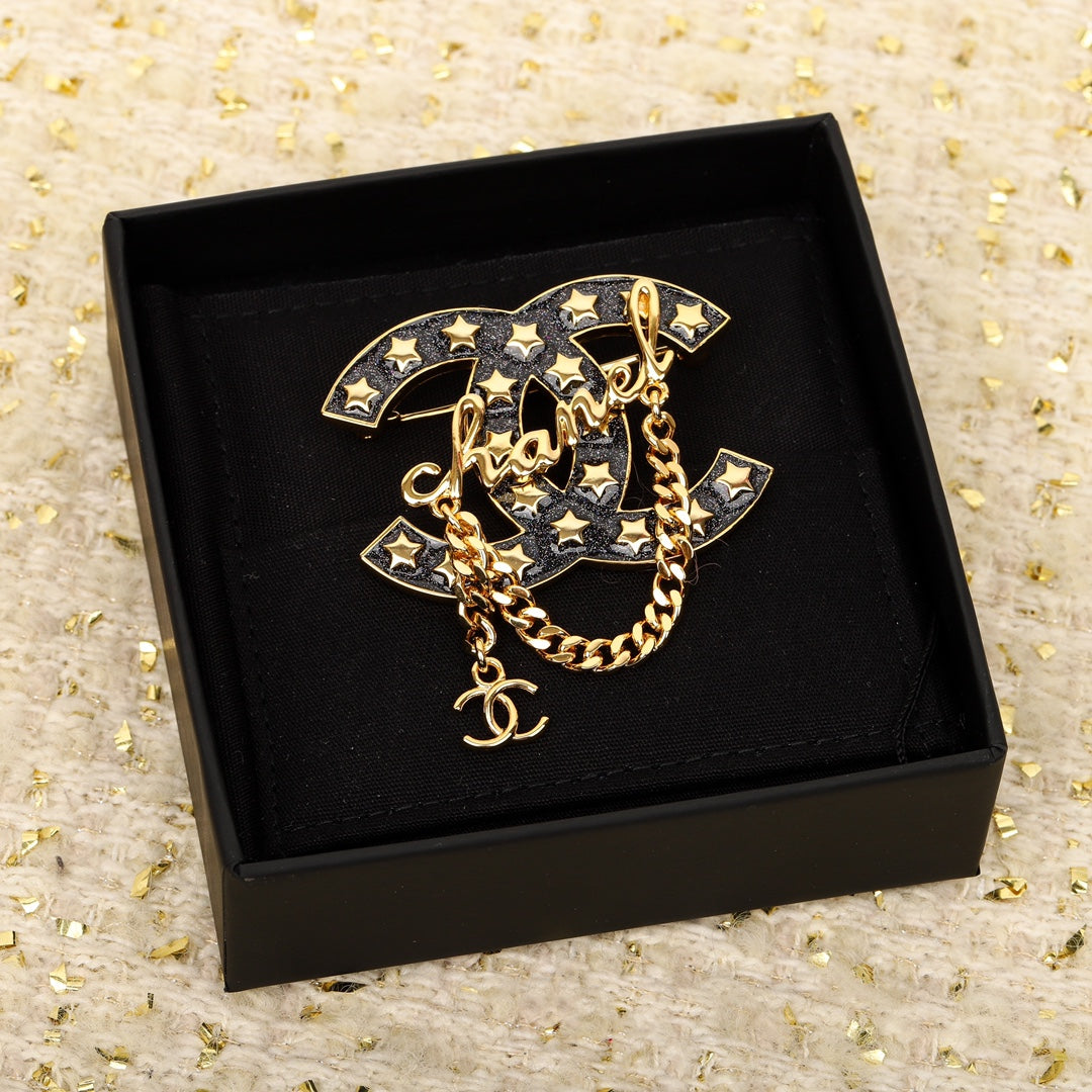 Chanel Black Chain 18K Gold Brooch product image 1, provided for visual reference and product detail review