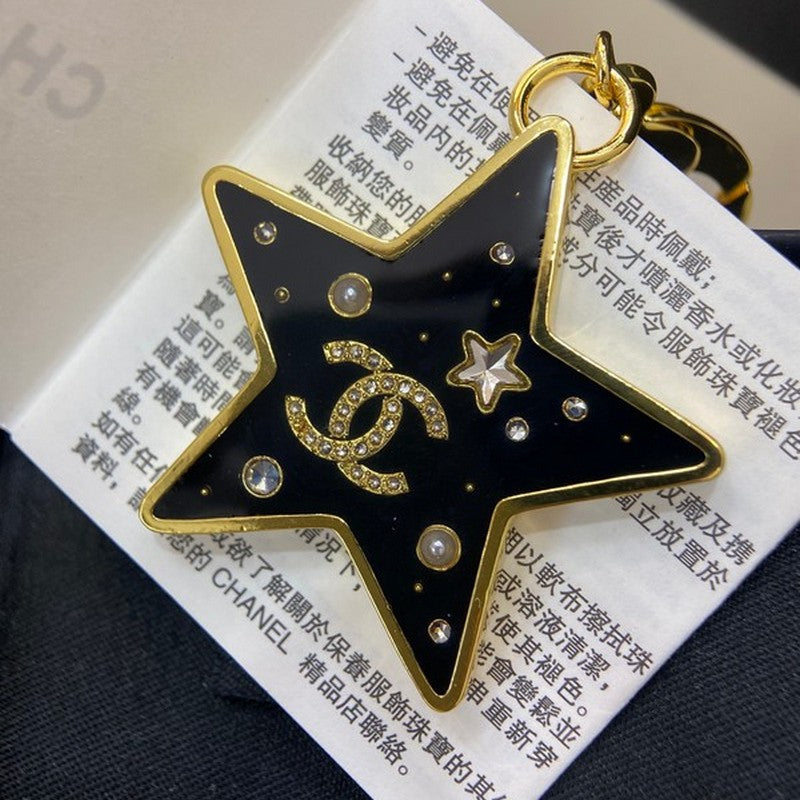 Chanel Black Gold Star 18K Gold Brooch product image 2, provided for visual reference and product detail review