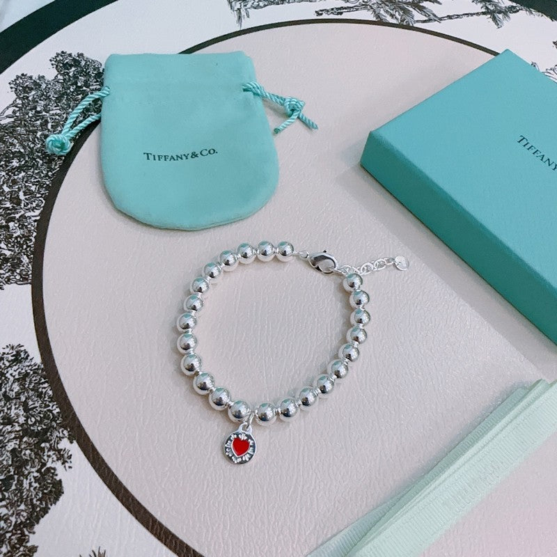 Tiffany Return to Red Heart Bead 18K Gold Bracelet product image 2, provided for visual reference and product detail review