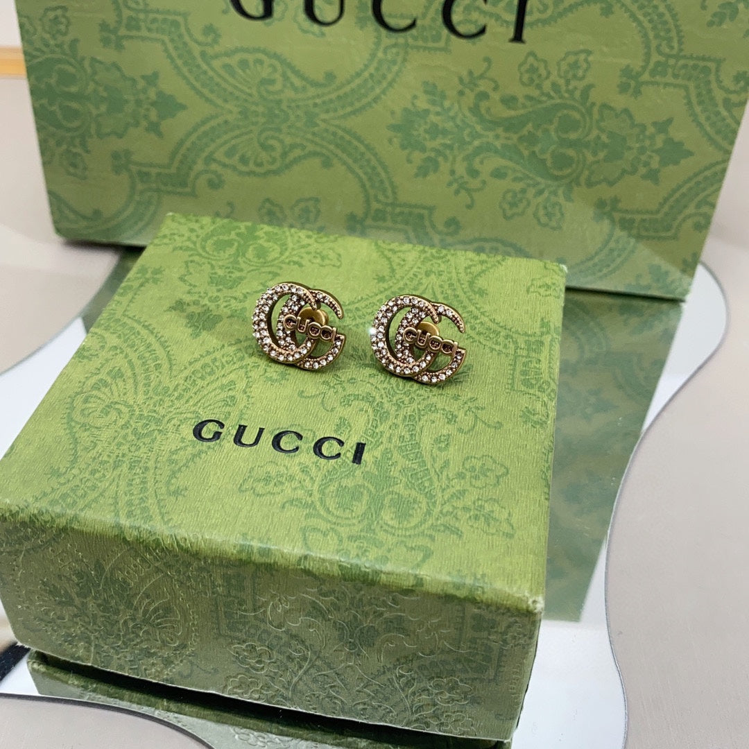 Gucci Double Logo Diamonds 18K Gold Earrings product image 4, provided for visual reference and product detail review