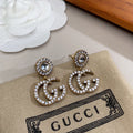 Gucci Double Crystal Pendant 18K Gold Earrings product image 1, provided for visual reference and product detail review