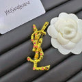 YSL Crystal 18K Gold Brooch product image 1, provided for visual reference and product detail review