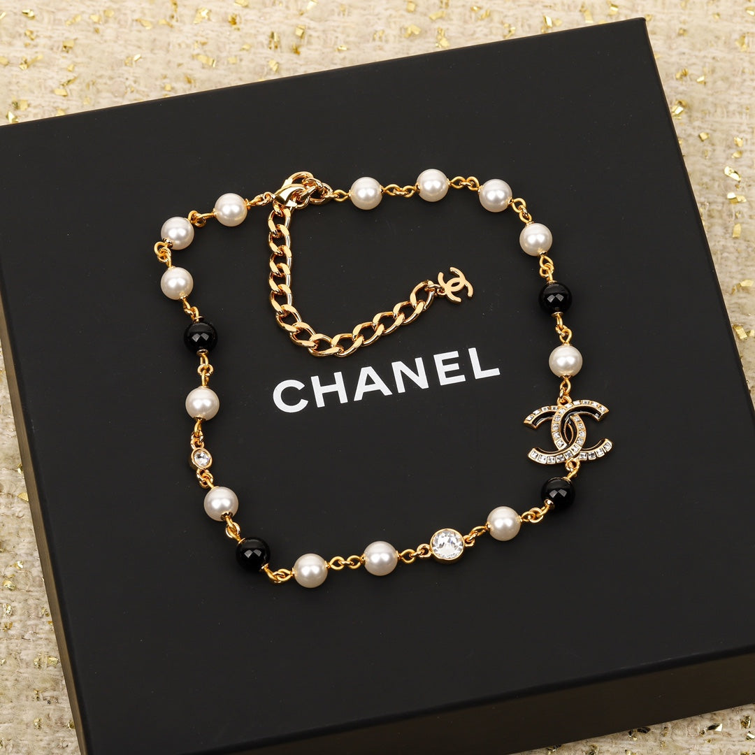 Chanel Black Pearls 18K Gold Necklace product image 1, provided for visual reference and product detail review