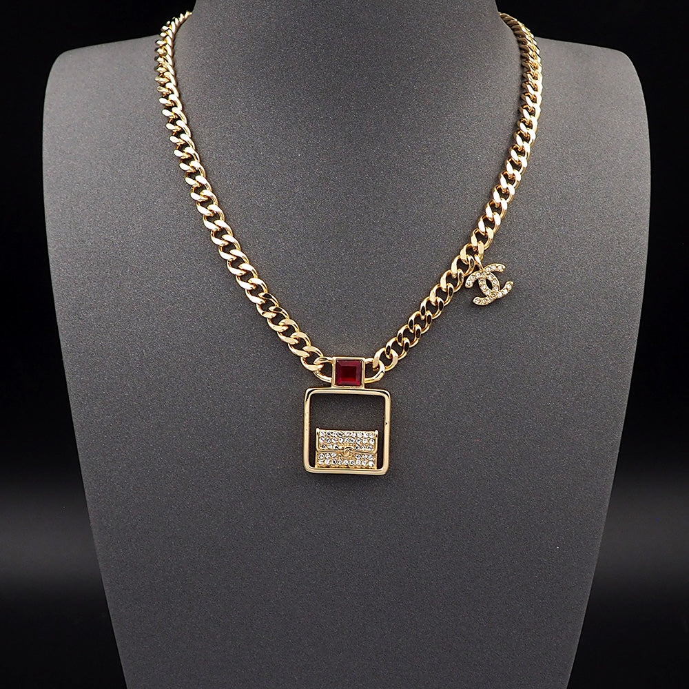 Chanel Red Bag Pendant 18K Gold Necklace product image 2, provided for visual reference and product detail review