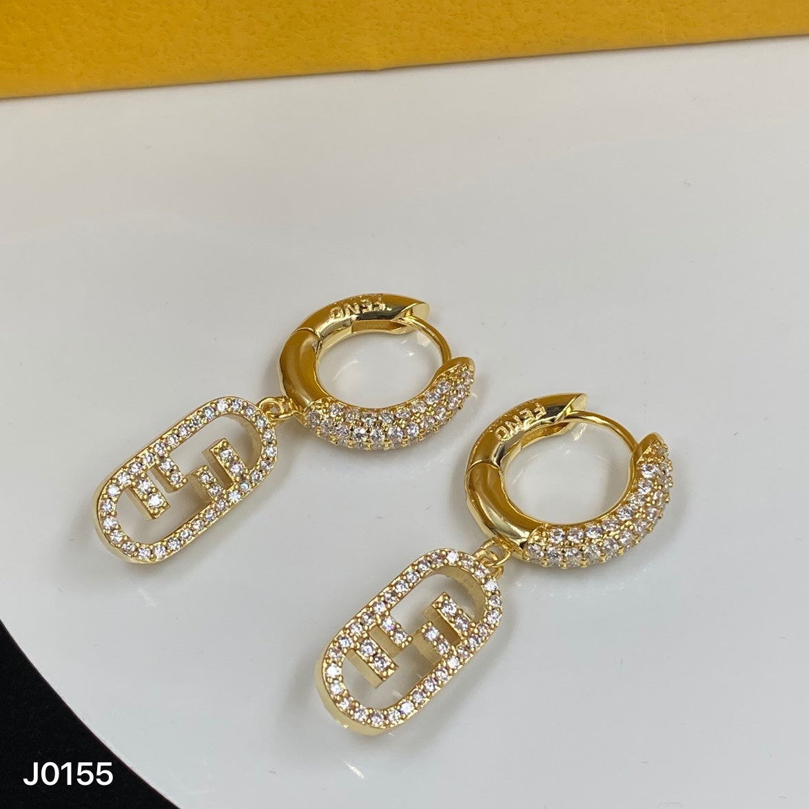 Fendi OLock Diamonds 18K Gold Earrings product image 2, provided for visual reference and product detail review