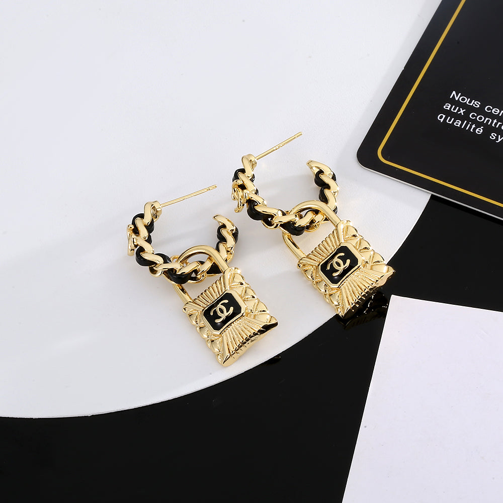 Chanel Lock 18K Gold Earrings product image 3, provided for visual reference and product detail review