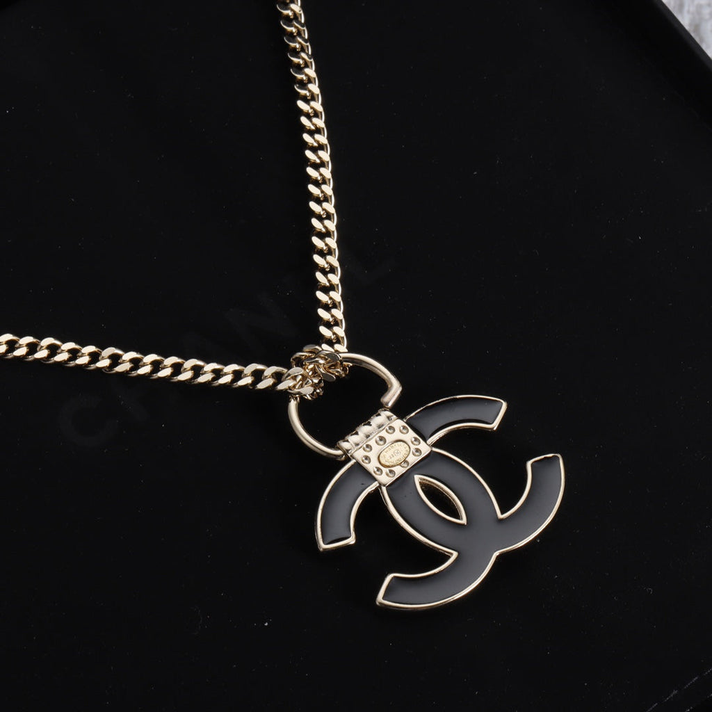 Chanel Black Resin Logo 18K Gold Necklace product image 3, provided for visual reference and product detail review