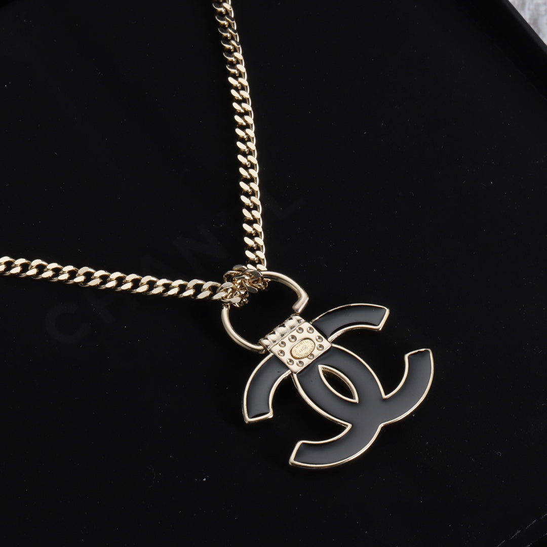 Chanel Black Resin Logo 18K Gold Necklace product image 3, provided for visual reference and product detail review