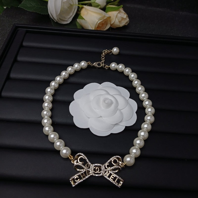 Chanel Bow Pearl 18K Gold Necklace product image 3, provided for visual reference and product detail review