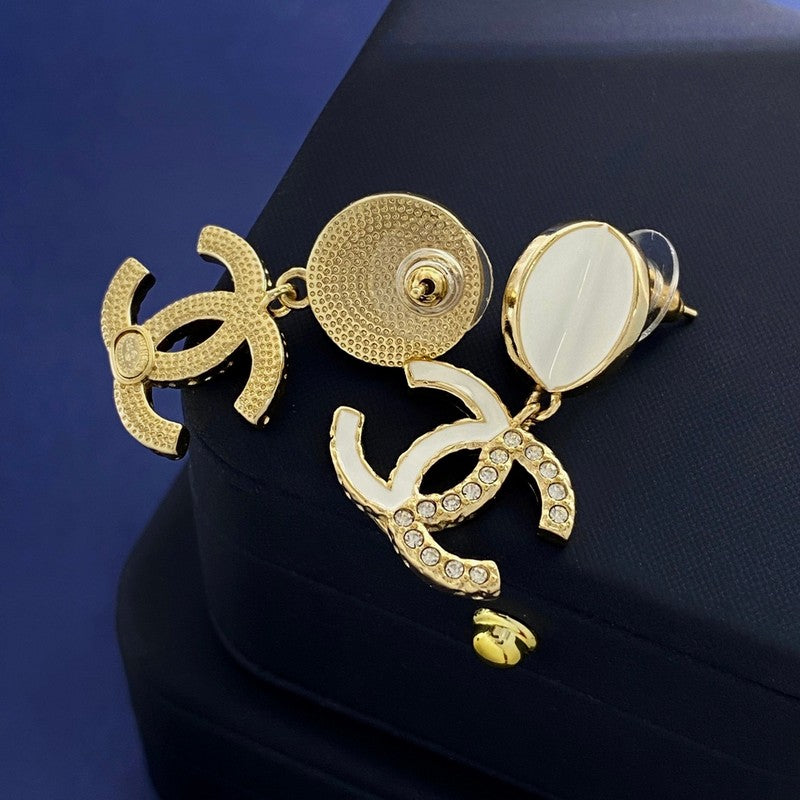 Chanel Half Diamond 18K Gold Earrings product image 2, provided for visual reference and product detail review