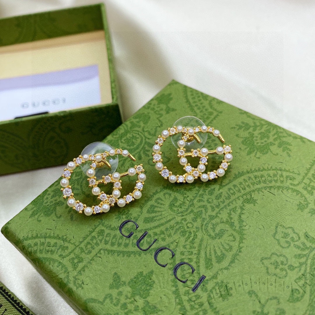 Gucci Double Pearls 18K Gold Earrings product image 1, provided for visual reference and product detail review