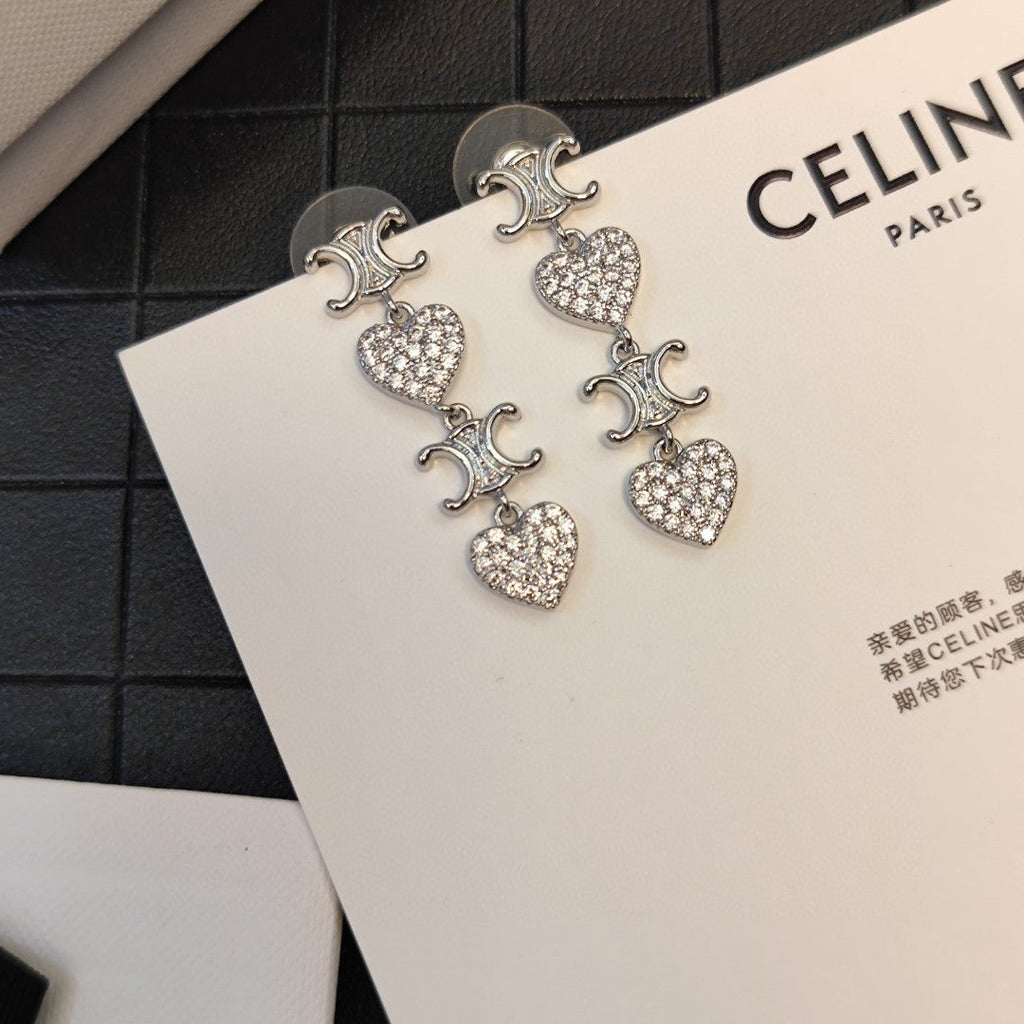 Celine Heart Pendant 18K Gold Earrings product image 3, provided for visual reference and product detail review