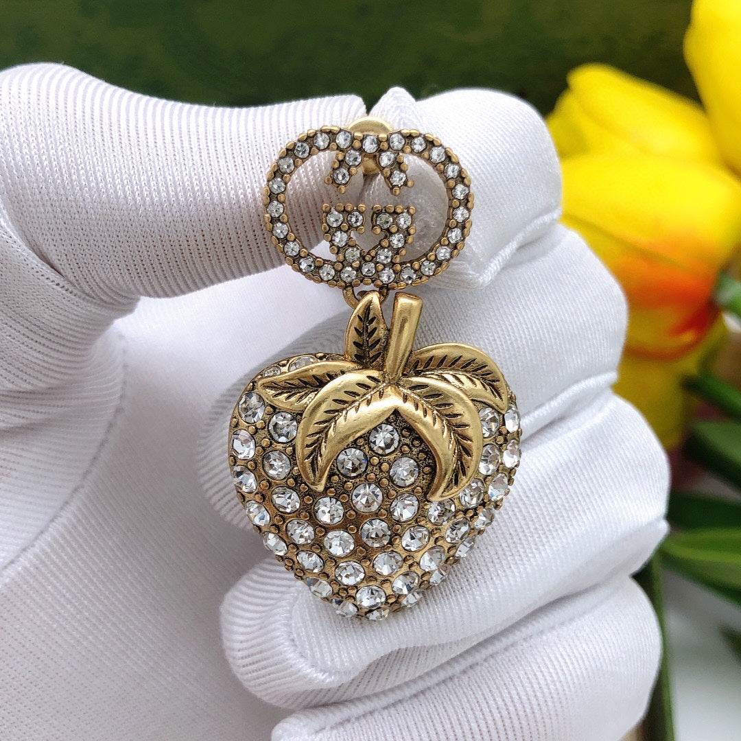 Gucci Double Crystal Strawberry Pendant 18K Gold Earrings product image 3, provided for visual reference and product detail