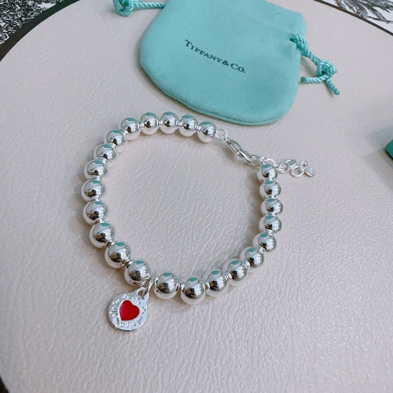 Tiffany Return to Red Heart Bead 18K Gold Bracelet product image 3, provided for visual reference and product detail review