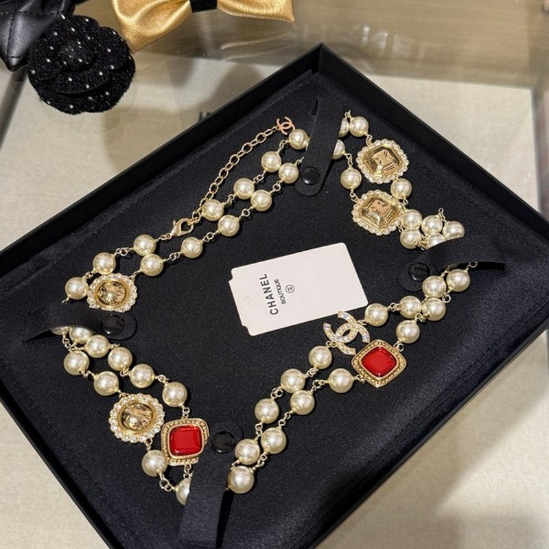 Chanel Long Pearl Red Crystals 18K Gold Necklace product image 1, provided for visual reference and product detail review