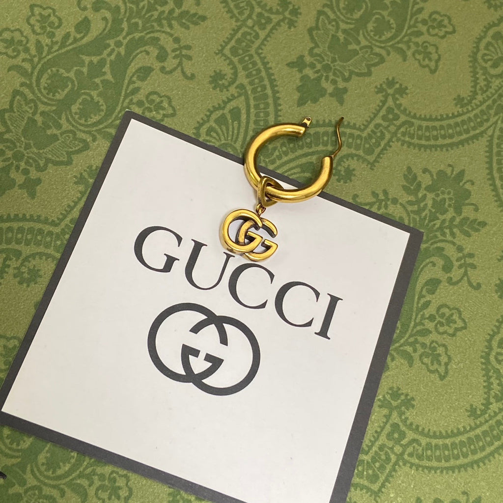 Gucci Double Hollow 18K Gold Earrings product image 4, provided for visual reference and product detail review