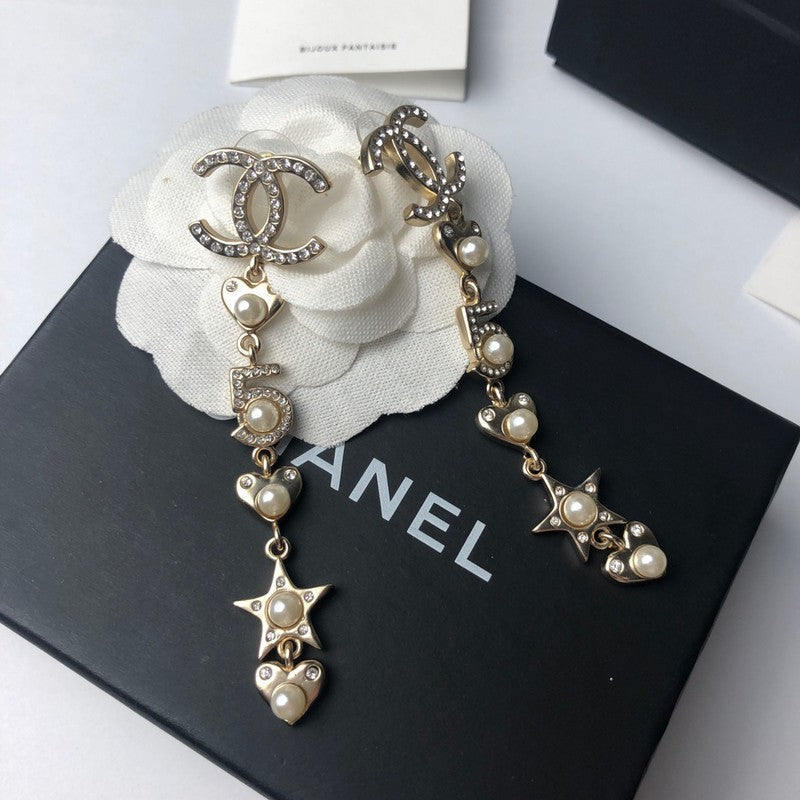 Chanel No.5 Long 18K Gold Earrings product image 3, provided for visual reference and product detail review
