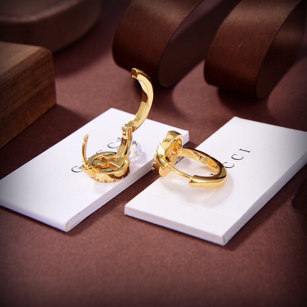Gucci Double Interlocking Gucci Diamond 18K Gold Earrings product image 4, provided for visual reference and product detail