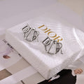 Dior 18K Gold Earrings product image 1, provided for visual reference and product detail review
