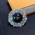 Louis Vuitton Black Ball 18K Gold Brooch product image 1, provided for visual reference and product detail review