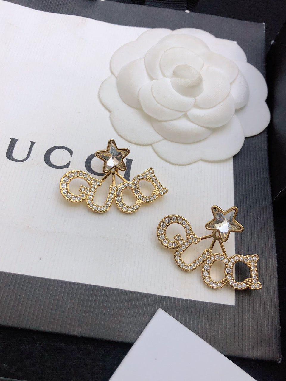 Gucci Double Script Star 18K Gold Earrings product image 2, provided for visual reference and product detail review