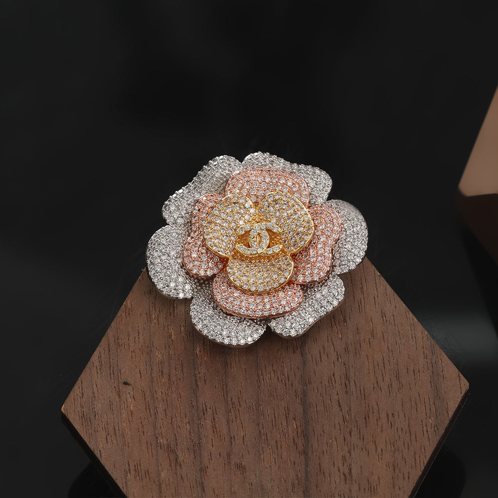Chanel Camellia Pink Diamonds 18K Gold Brooch product image 1, provided for visual reference and product detail review