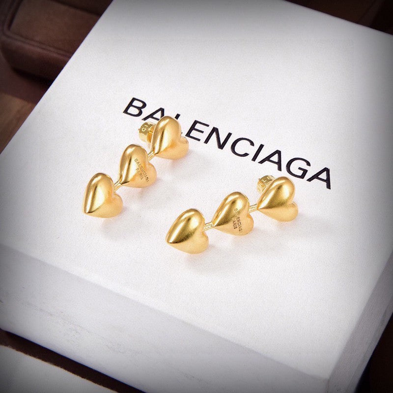 Balenciaga Three Heart Gold 18K Gold Earrings product image 3, provided for visual reference and product detail review