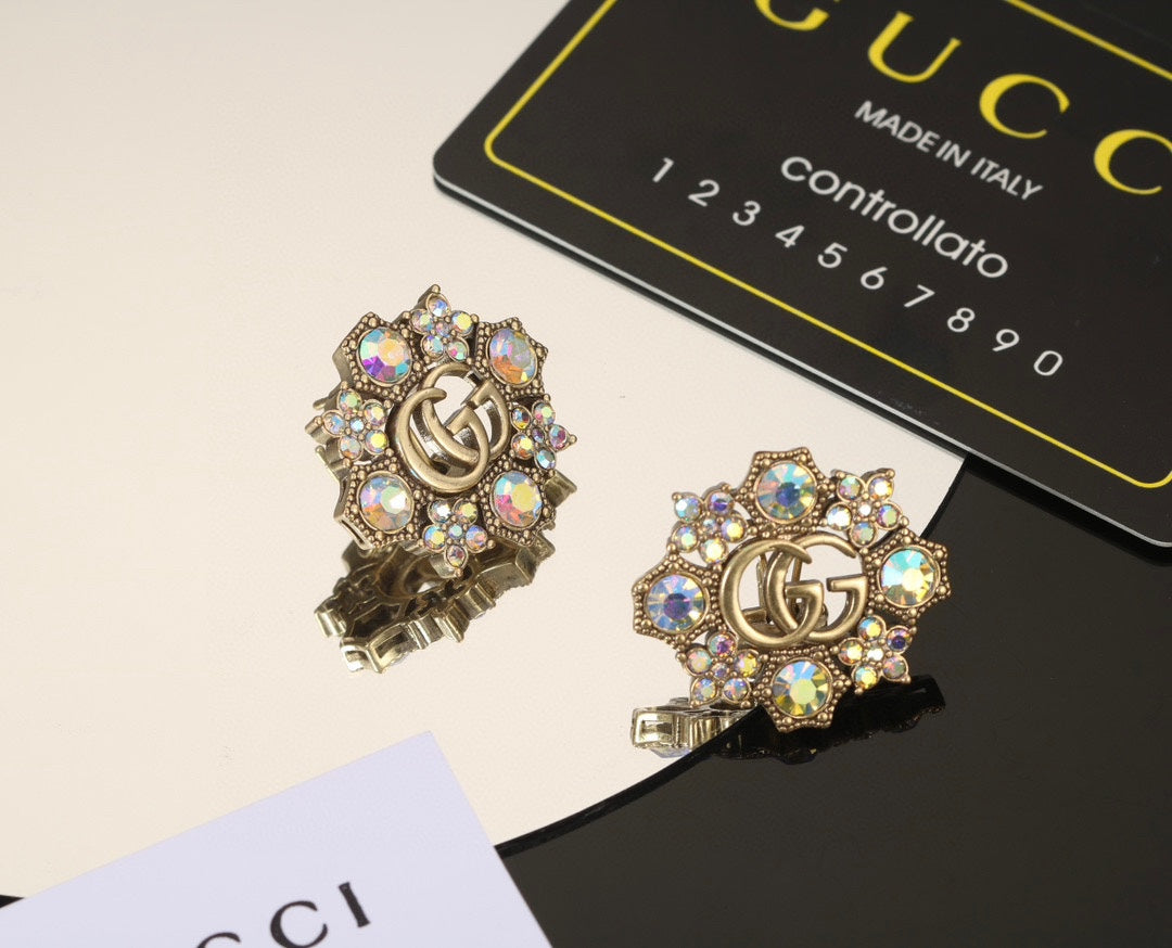 Gucci Double Blue Flowers 18K Gold Earrings product image 1, provided for visual reference and product detail review