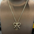 Chanel Gold Bow Tie 18K Gold Necklace product image 1, provided for visual reference and product detail review