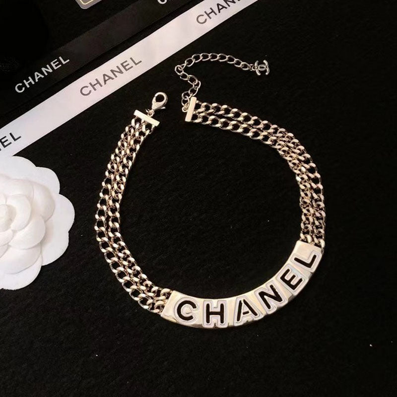 Chanel White Logo Choker 18K Gold Necklace product image 1, provided for visual reference and product detail review