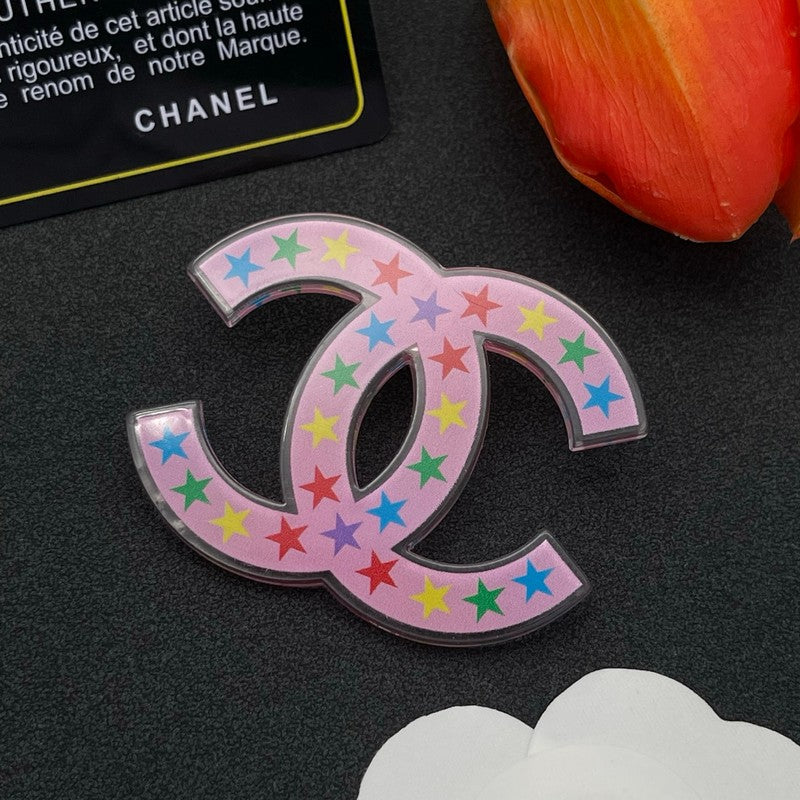 Chanel Pink & Black Star 18K Gold Brooch product image 3, provided for visual reference and product detail review
