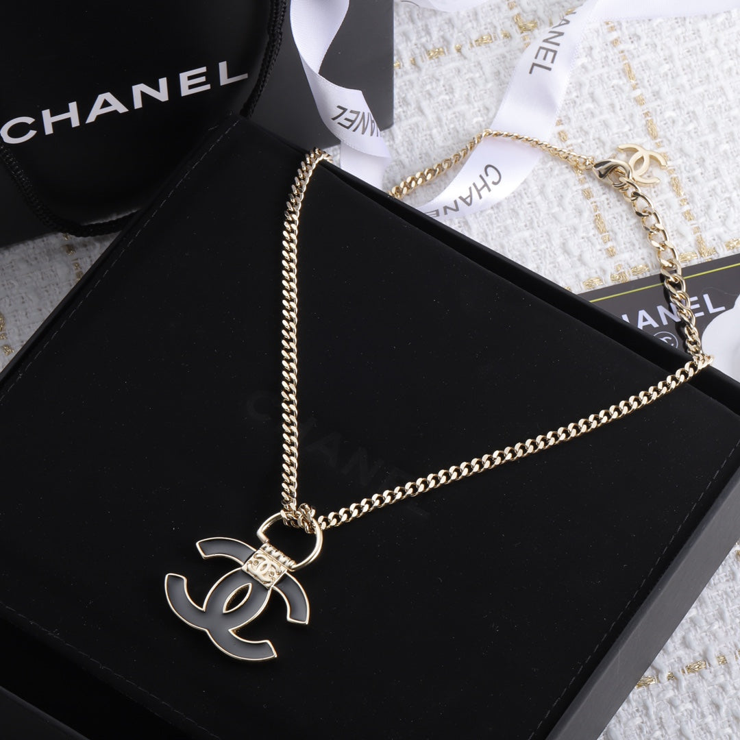 Chanel Black Resin Logo 18K Gold Necklace product image 4, provided for visual reference and product detail review