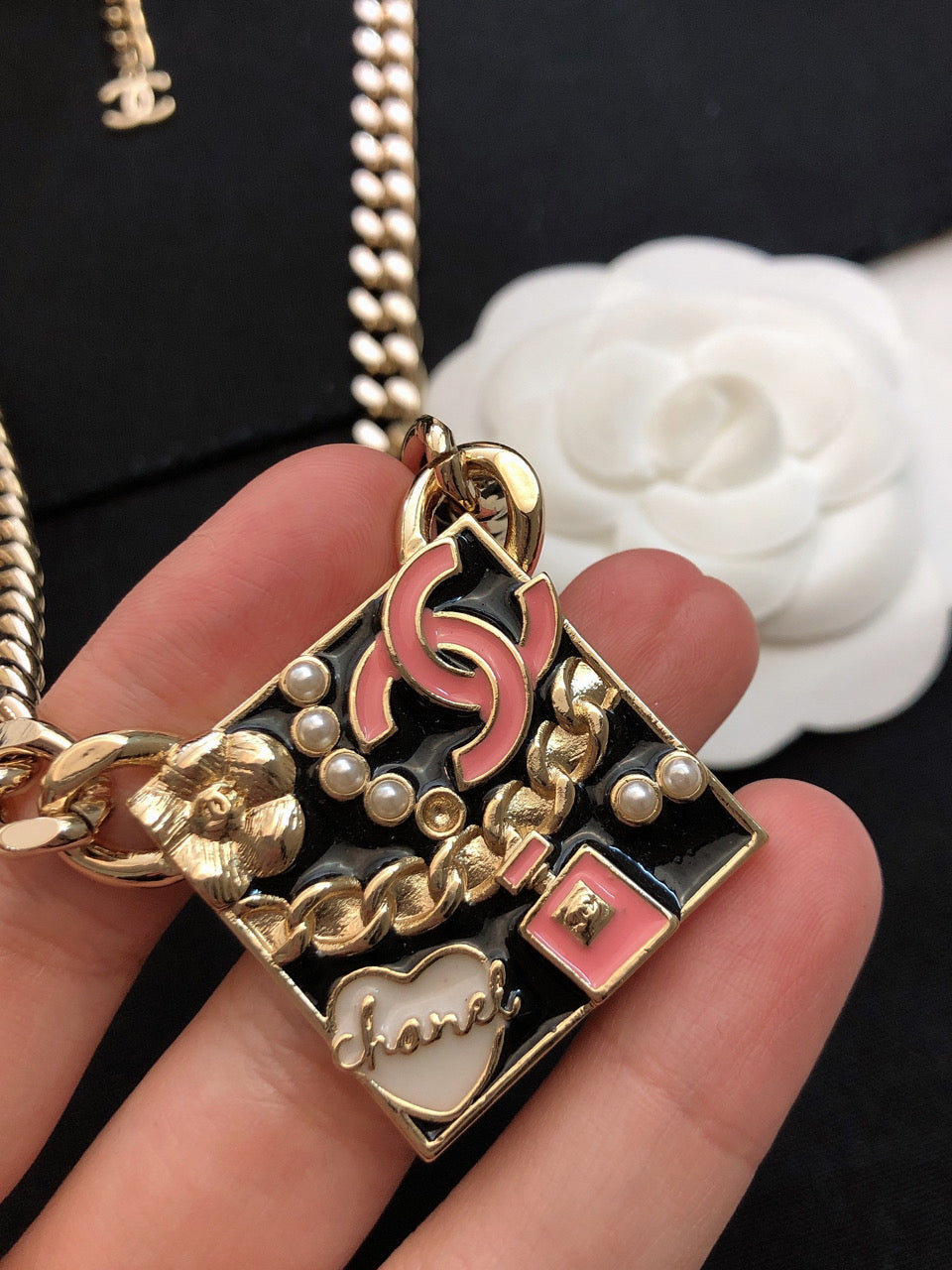 Chanel Pink Logo Chain 18K Gold Necklace product image 2, provided for visual reference and product detail review