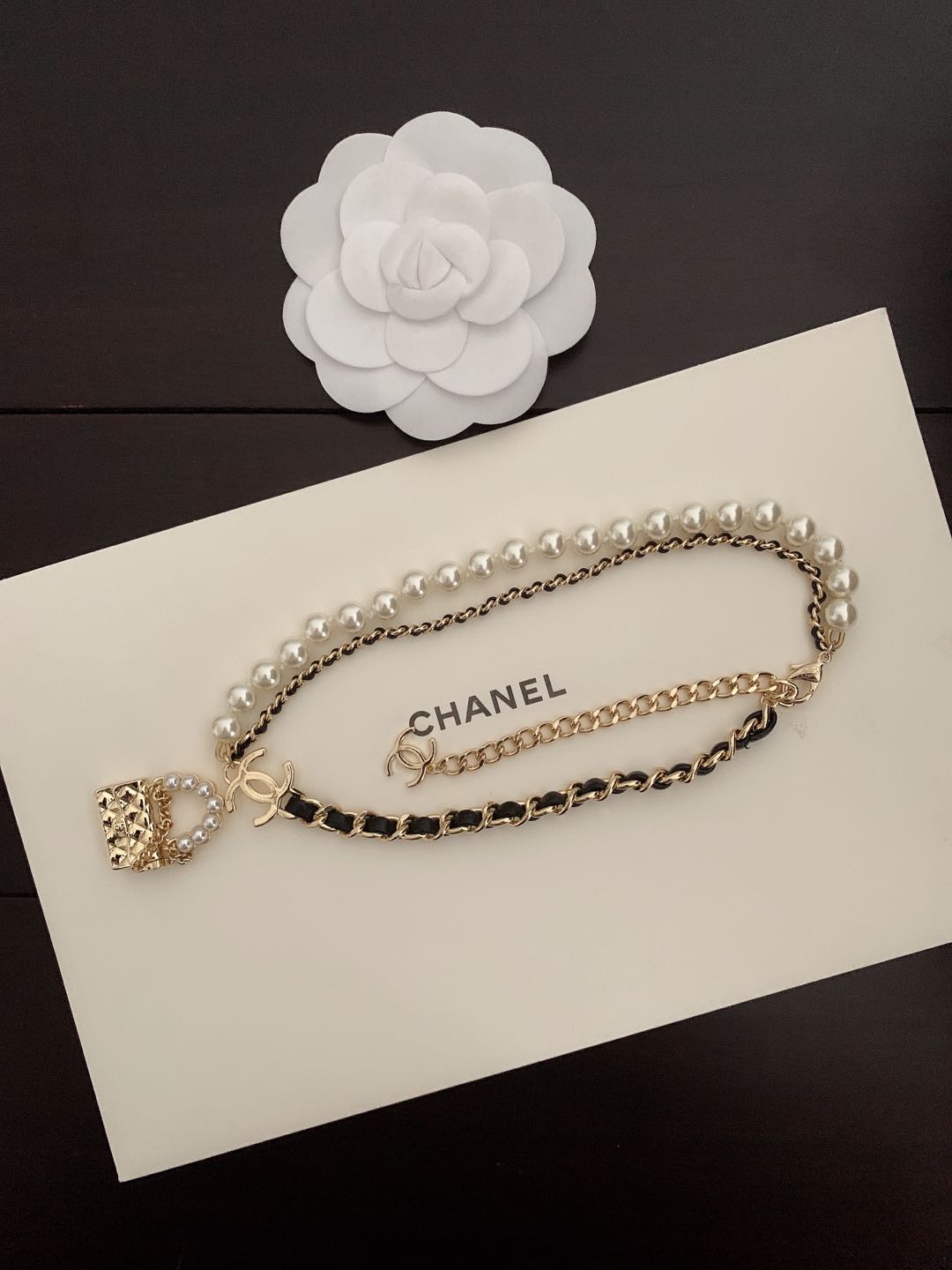 Chanel Pearl Leather Bag Pendant 18K Gold Necklace product image 4, provided for visual reference and product detail review