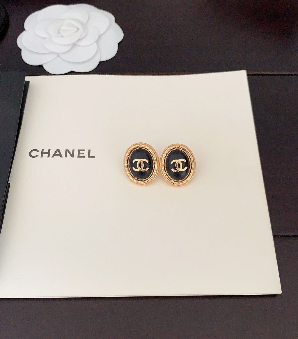 Chanel Oval Leather 18K Gold Earrings product image 4, provided for visual reference and product detail review