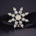 Chanel Flower Crystals 18K Gold Brooch product image 1, provided for visual reference and product detail review