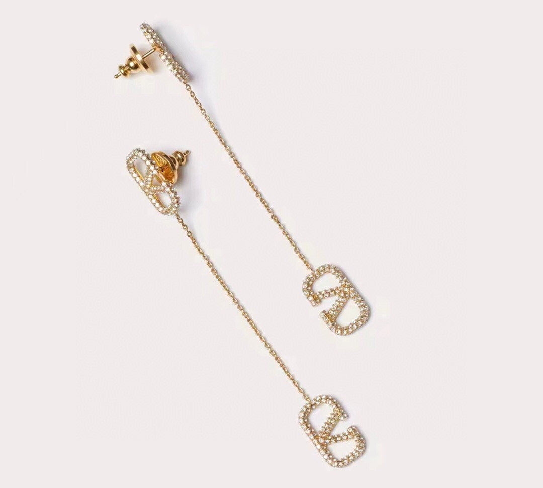 Valentino Crystal Valentino Signature 18K Gold Earrings product image 2, provided for visual reference and product detail
