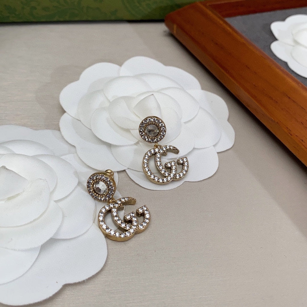 Gucci Double Crystal Pendant 18K Gold Earrings product image 2, provided for visual reference and product detail review