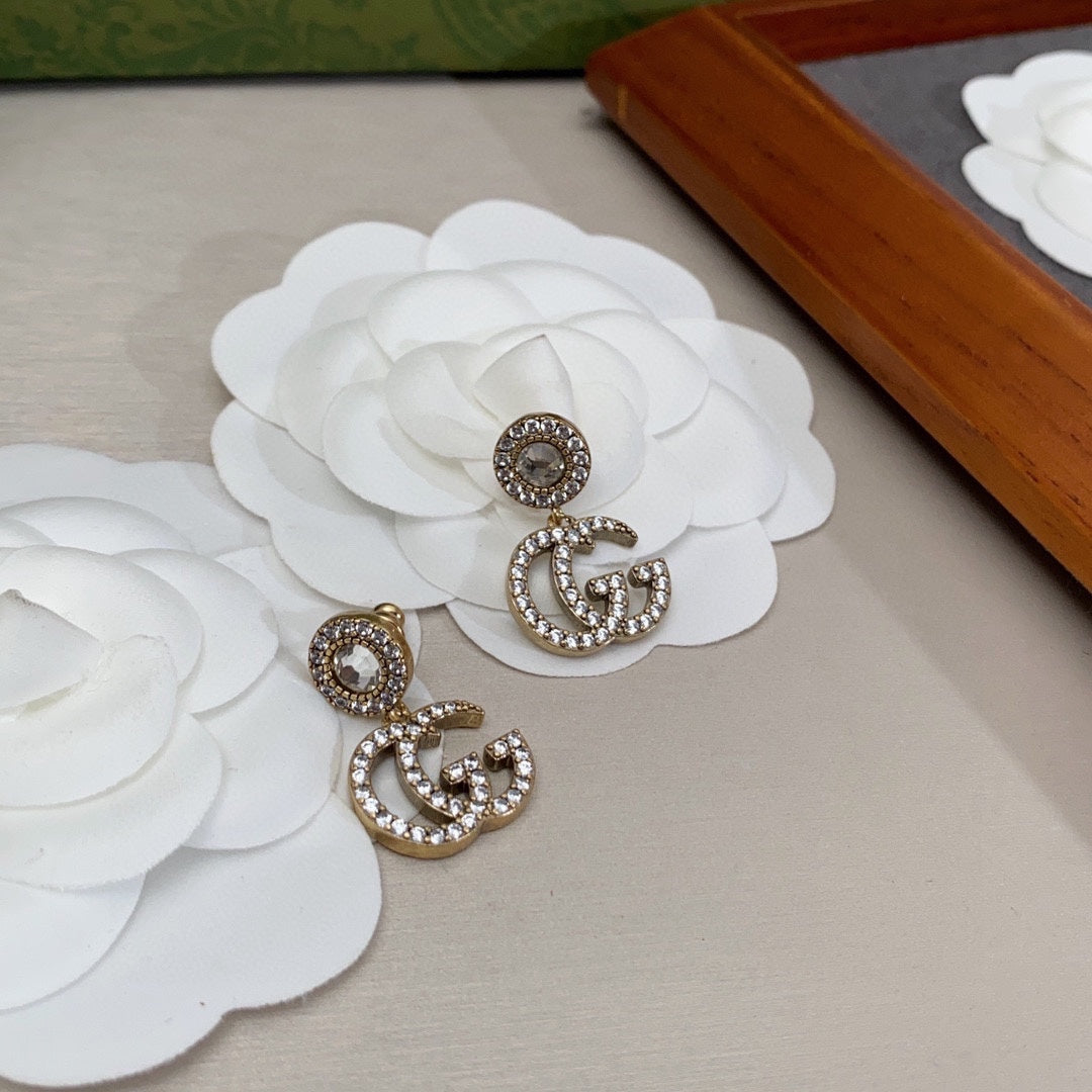 Gucci Double Crystal Pendant 18K Gold Earrings product image 2, provided for visual reference and product detail review