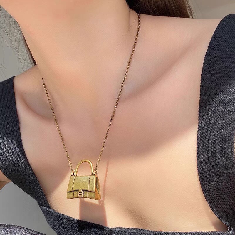 Balenciaga Hourglass Bag 18K Gold Necklace product image 3, provided for visual reference and product detail review