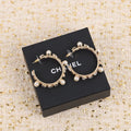 Chanel Pearl Crystal 18K Gold Earrings product image 1, provided for visual reference and product detail review