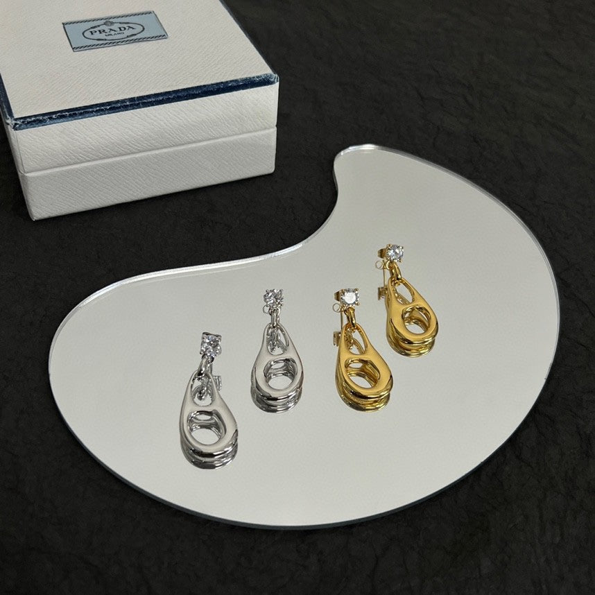 Prada Inverted Triangle 18K Gold Earrings product image 7, provided for visual reference and product detail review