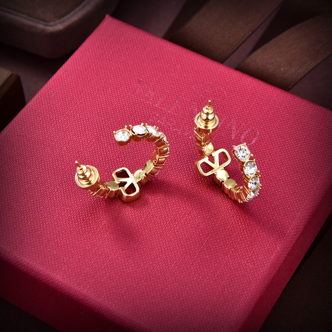 Valentino Valentino Signature 18K Gold Earrings product image 3, provided for visual reference and product detail review