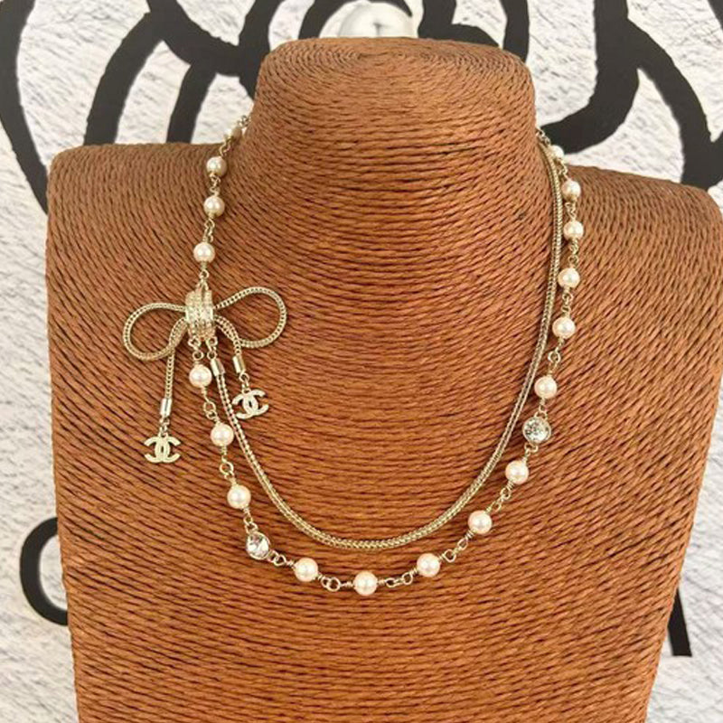Chanel Bow Tie Pearl 18K Gold Necklace product image 2, provided for visual reference and product detail review