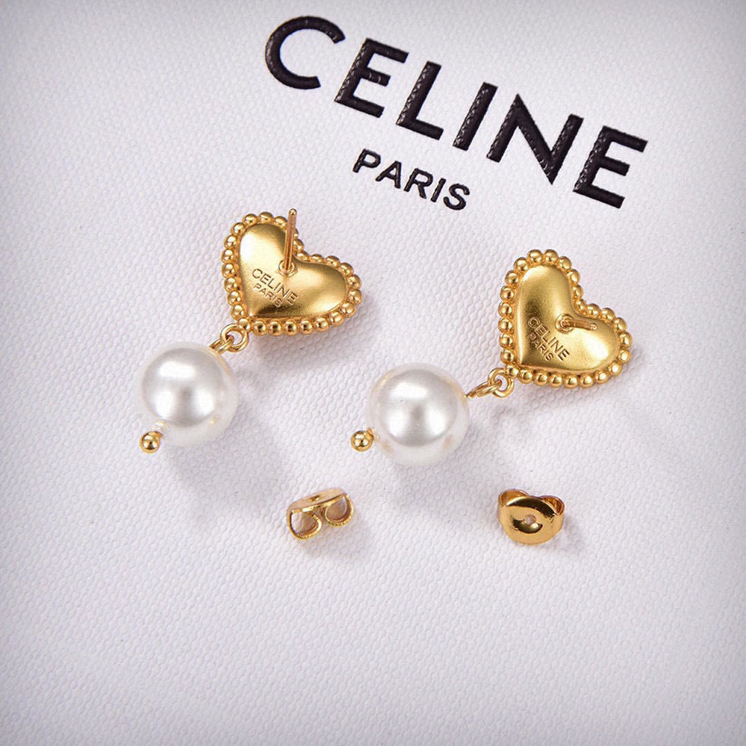 Celine Heart Pearls 18K Gold Earrings product image 1, provided for visual reference and product detail review
