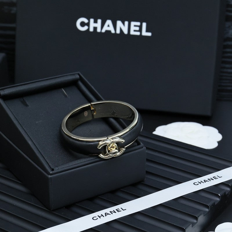 Chanel Black Leather Cuff 18K Gold Bracelet product image 3, provided for visual reference and product detail review