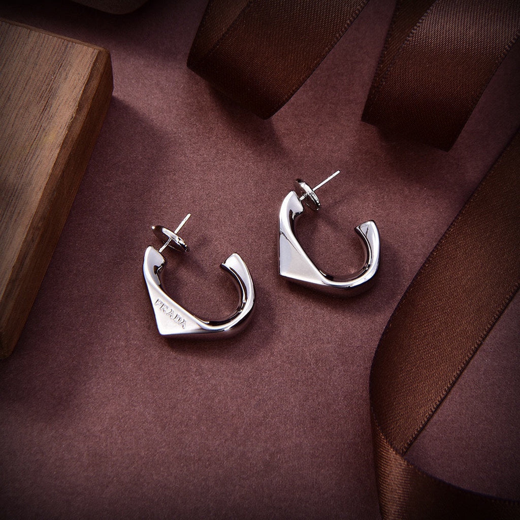 Prada Triangle Open 18K Gold Earrings product image 7, provided for visual reference and product detail review